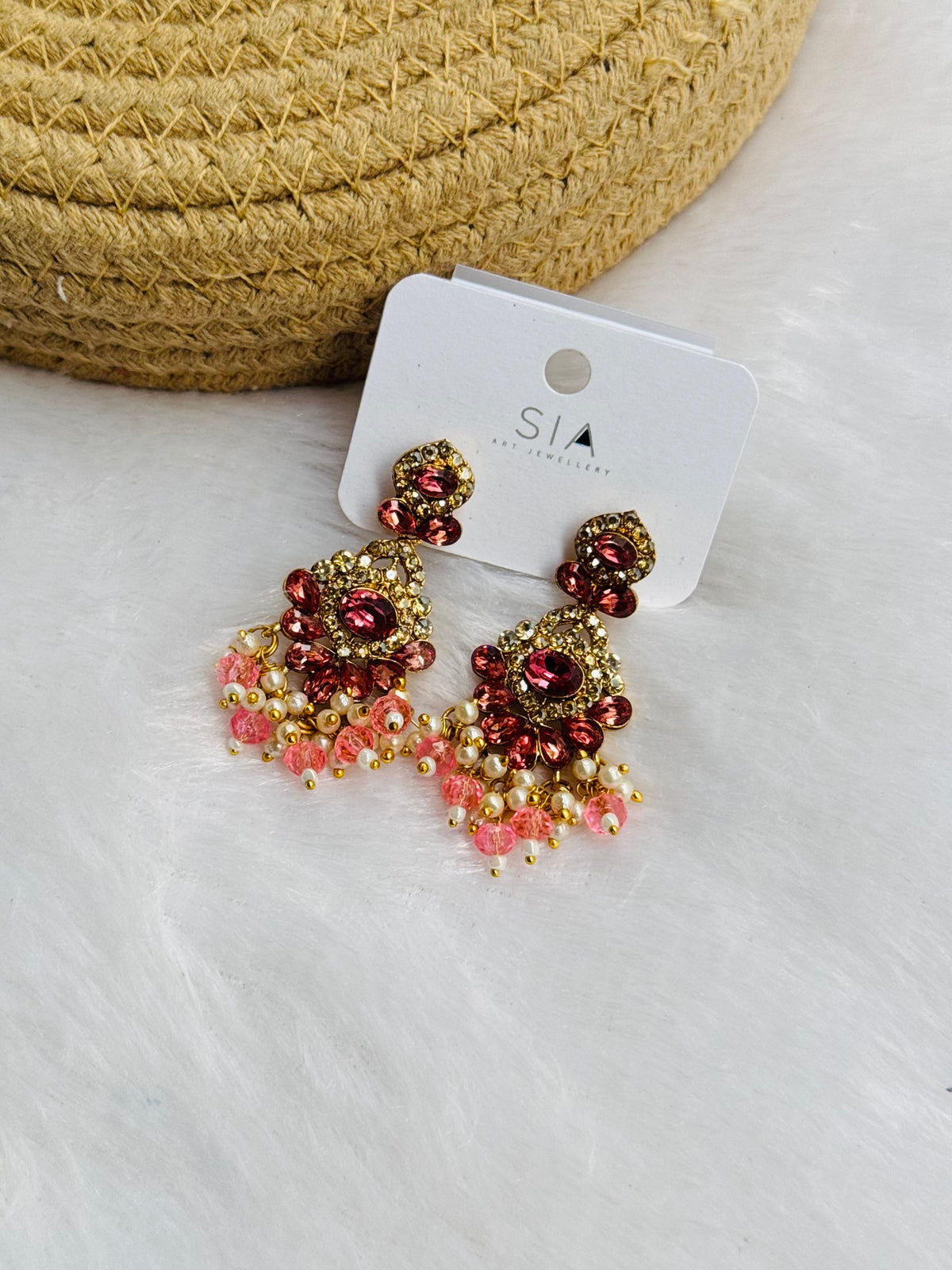 Pearl charm earring